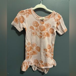 Kate Quinn ruffle leg